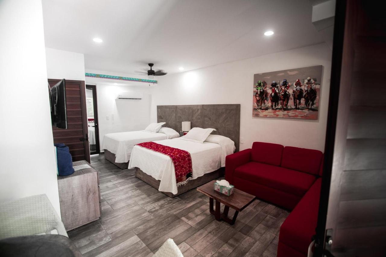 Hotel Paradise Suites Исла-Мухерес Экстерьер фото